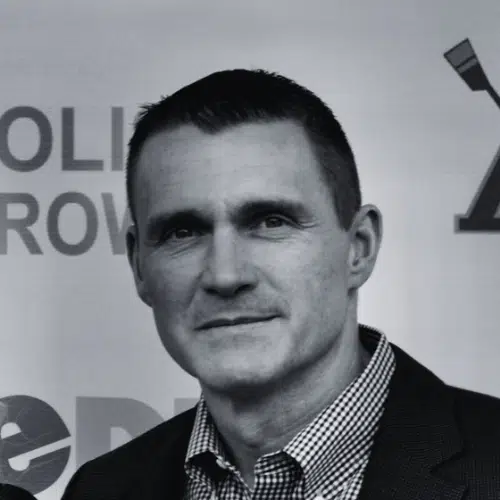 Headshot of Tom Perchinsky, VP of Global Sales at SCLogic.